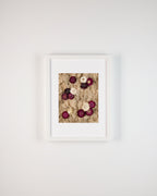 White and deep purple or burgundy flowers on nude or beige moss fine art print on a white wall