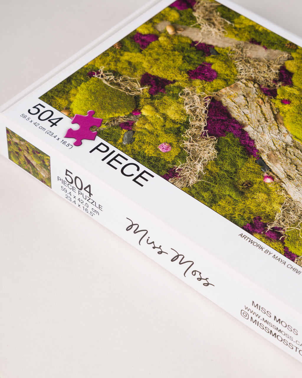 504 piece jigsaw puzzle titled 'Forest Floor' with a forest design on the cover side view