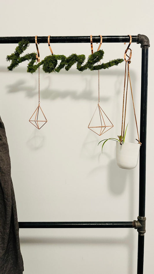 Mossy 'Home' Sign