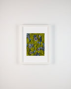 Framed fine art print of blue thistle on green and blue moss 